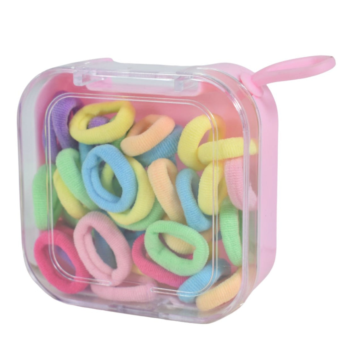 Gomas de pelo en estuche plástico 7x7x3cm.