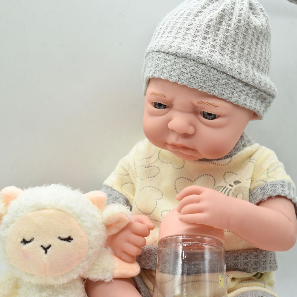 Muñeco bebé de goma realista con manta y accesorios 35cm