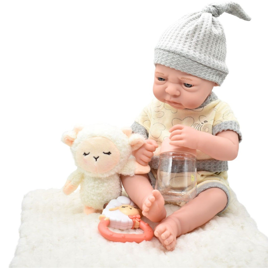 Muñeco bebé de goma realista con manta y accesorios 35cm