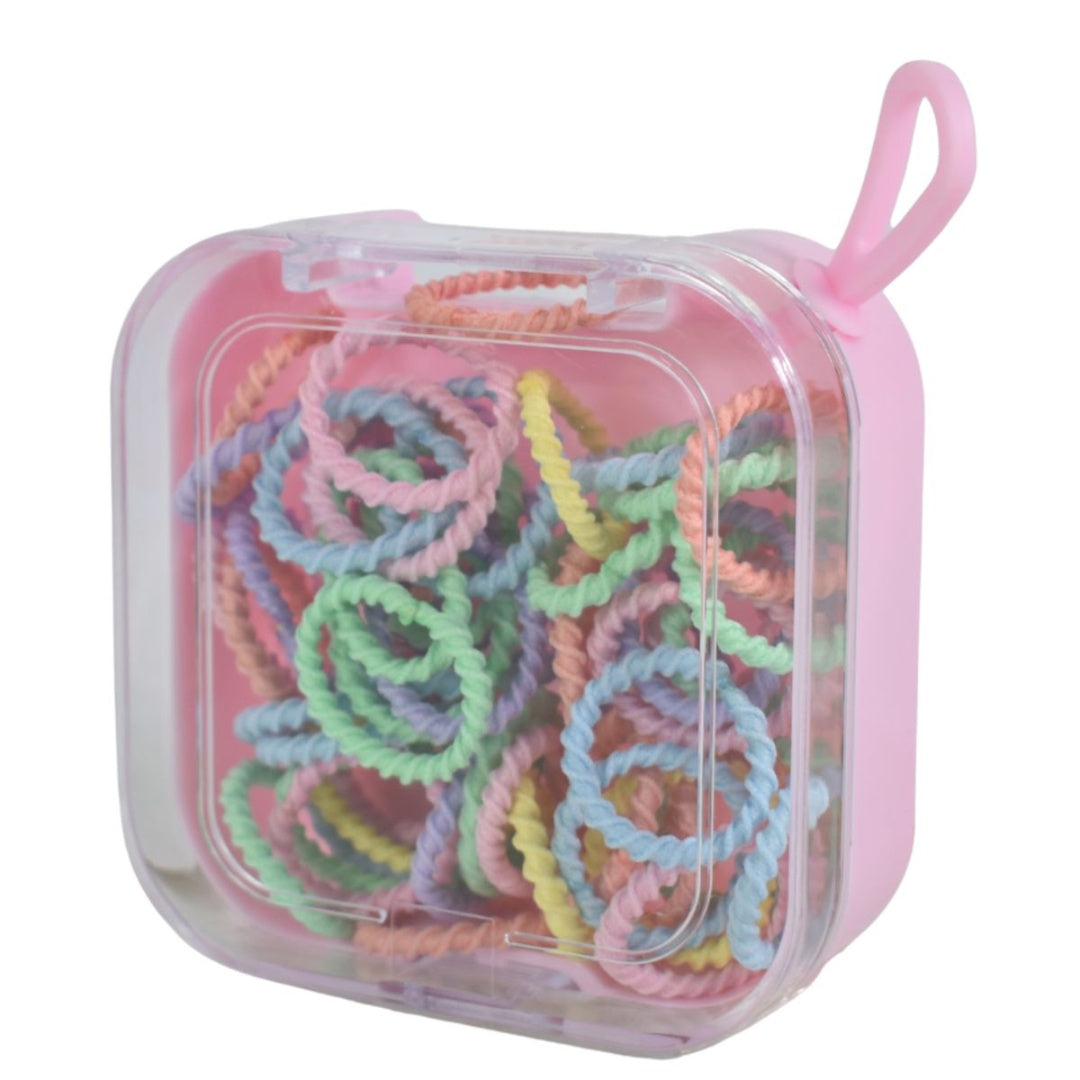 Gomas de pelo en estuche plástico 7x7x3cm